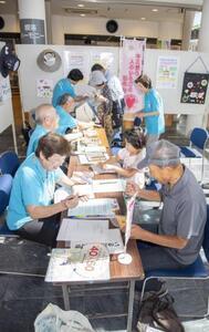 写真：児島健康まつりでの啓発の様子