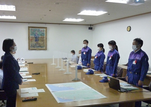 写真:帰着報告